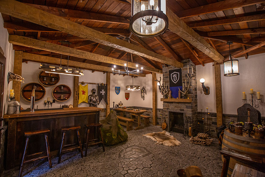 Basement bar ideas are endless when you consider the uses for faux stone, brick, and wood panels.