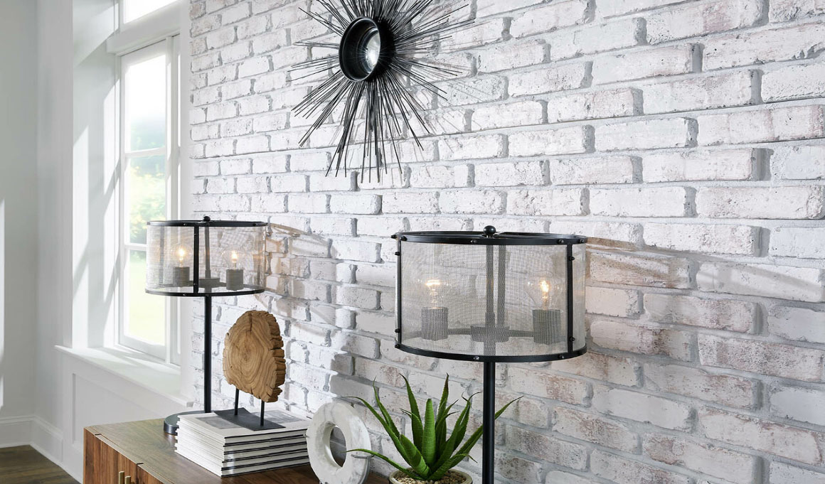 a whitewashed brick faux wall panel on the interior wall of a living room