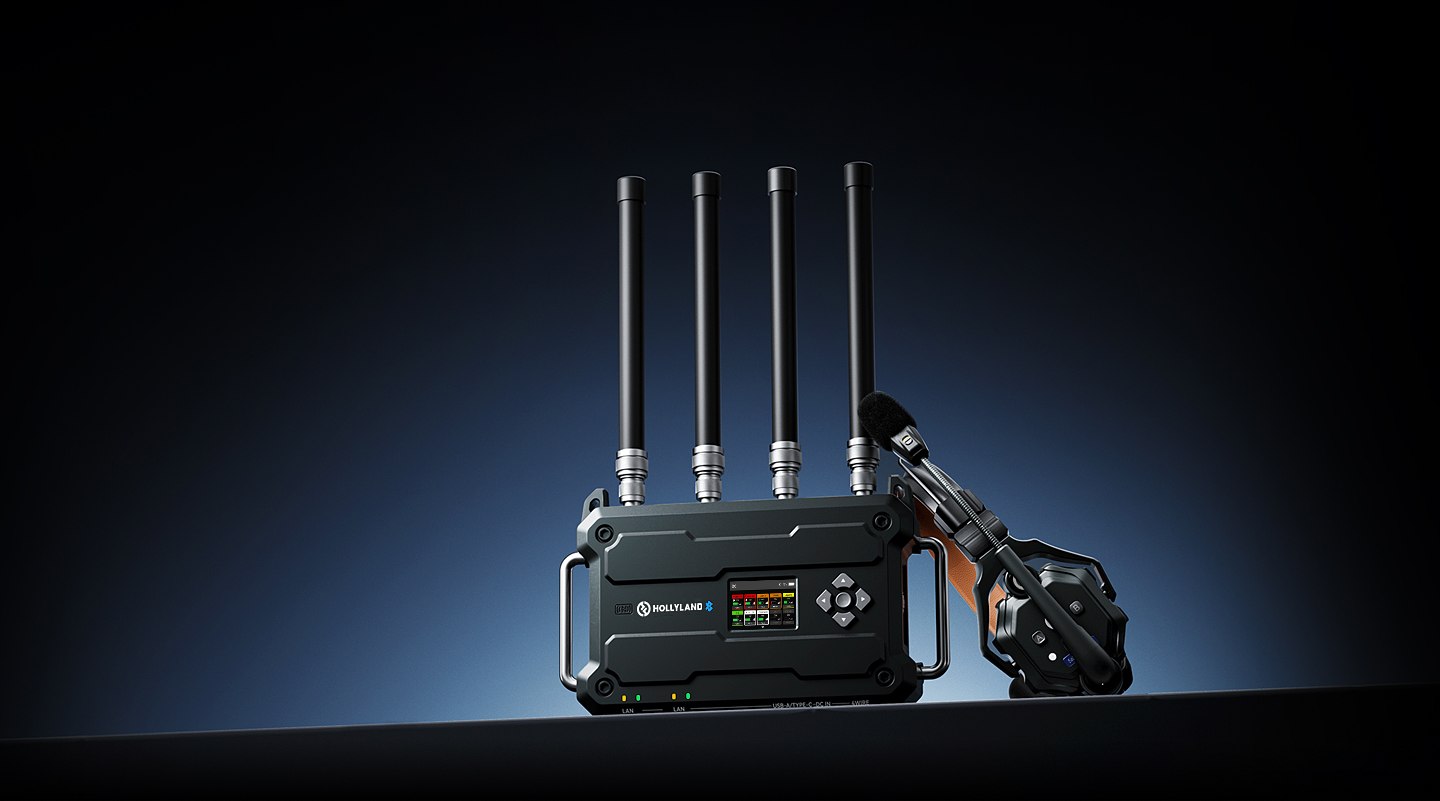The Solidcom C1 Pro Roaming Hub with its four omnidirectional antennas fitted,
                                  a headset resting against it.