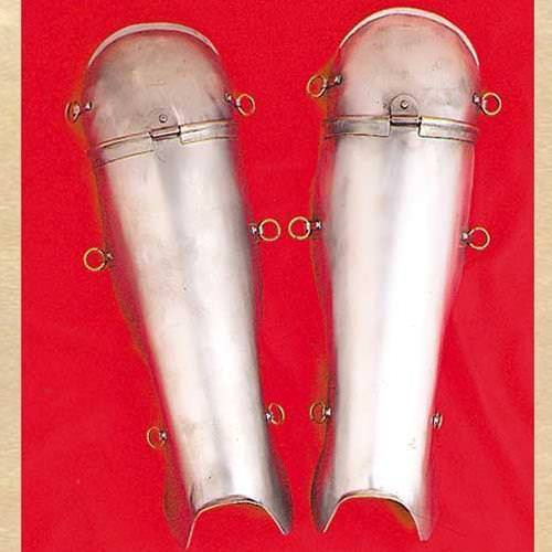 Steel Roman Greaves are 18 gauge steel with articulated knee piece, can be tied with leather laces or straps for a custom look
