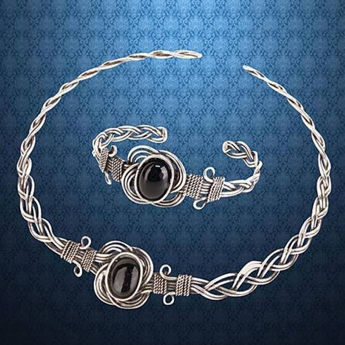 bracelet is stainless steel wire with a faux black onyx stone in the Celtic knot, pairs with the Celtic knot Onyx necklace