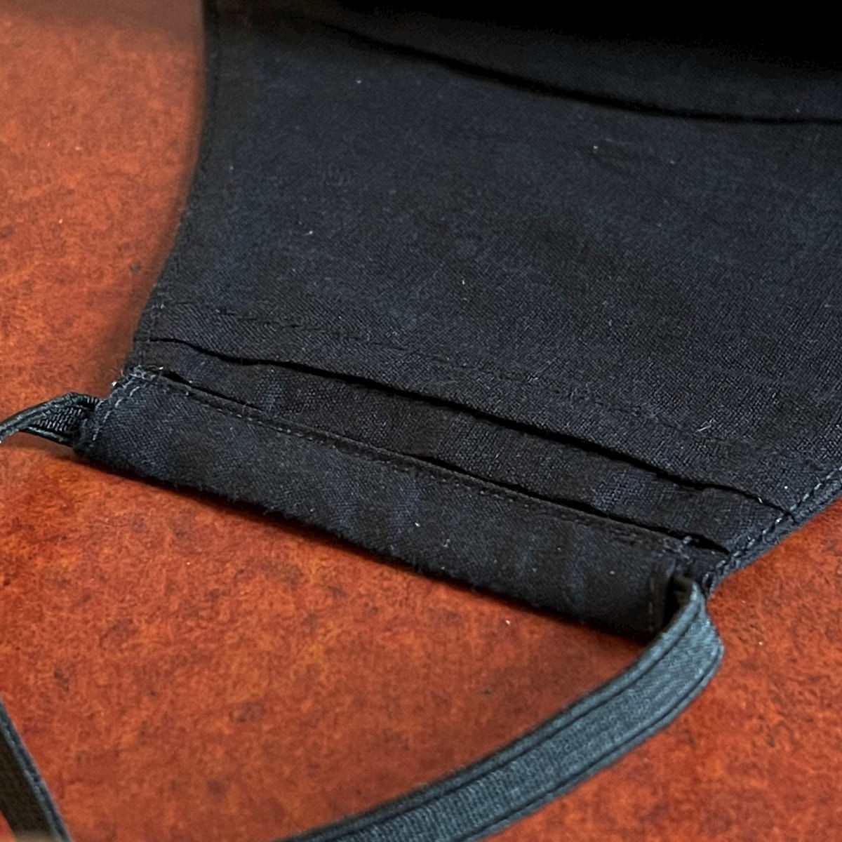 Black Cotton Crusader Shield Face Mask has layers with a sleeve so you can insert an additional disposable filter