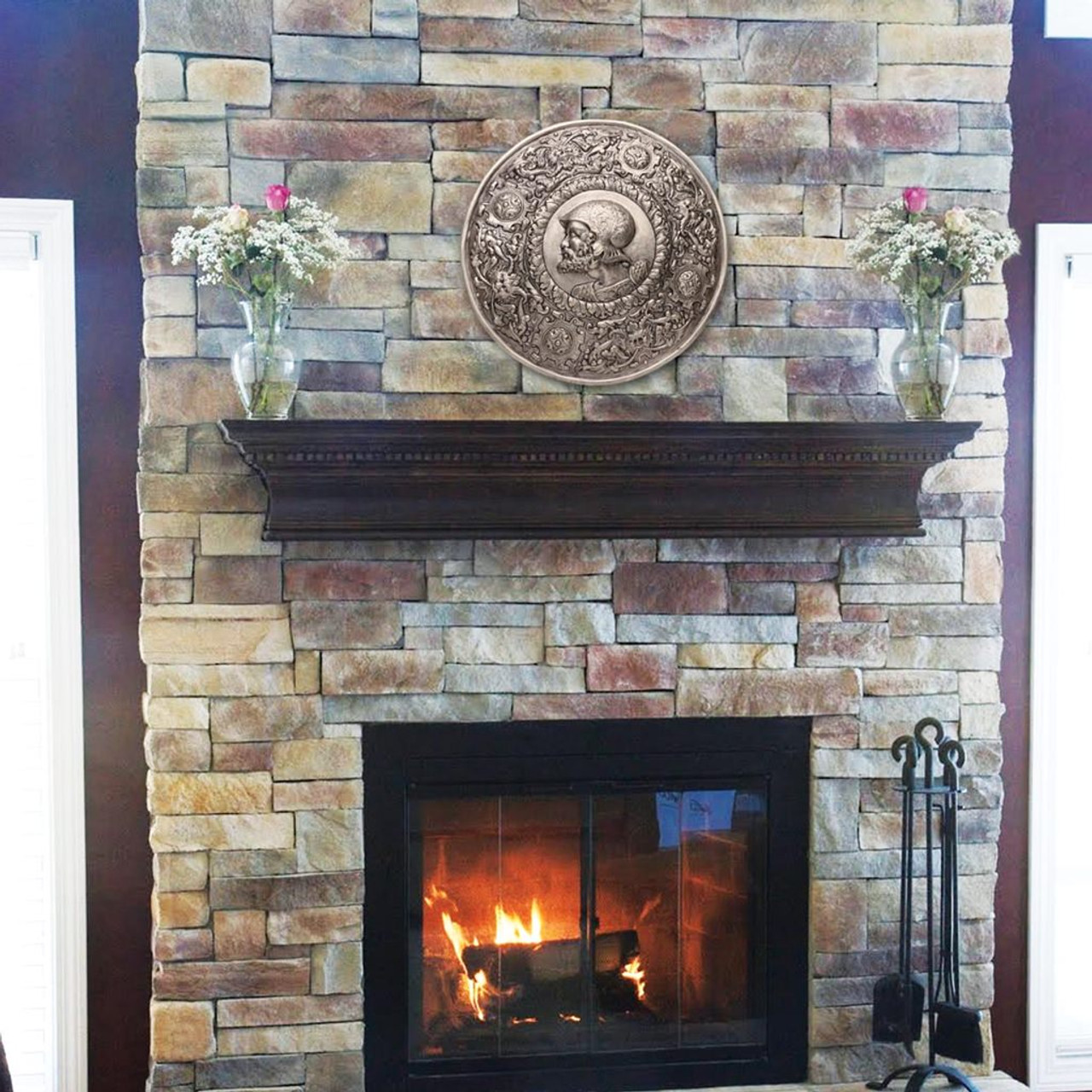 Julius Caesar Embossed Decorative Roman Shield in steel finish hanging on wall