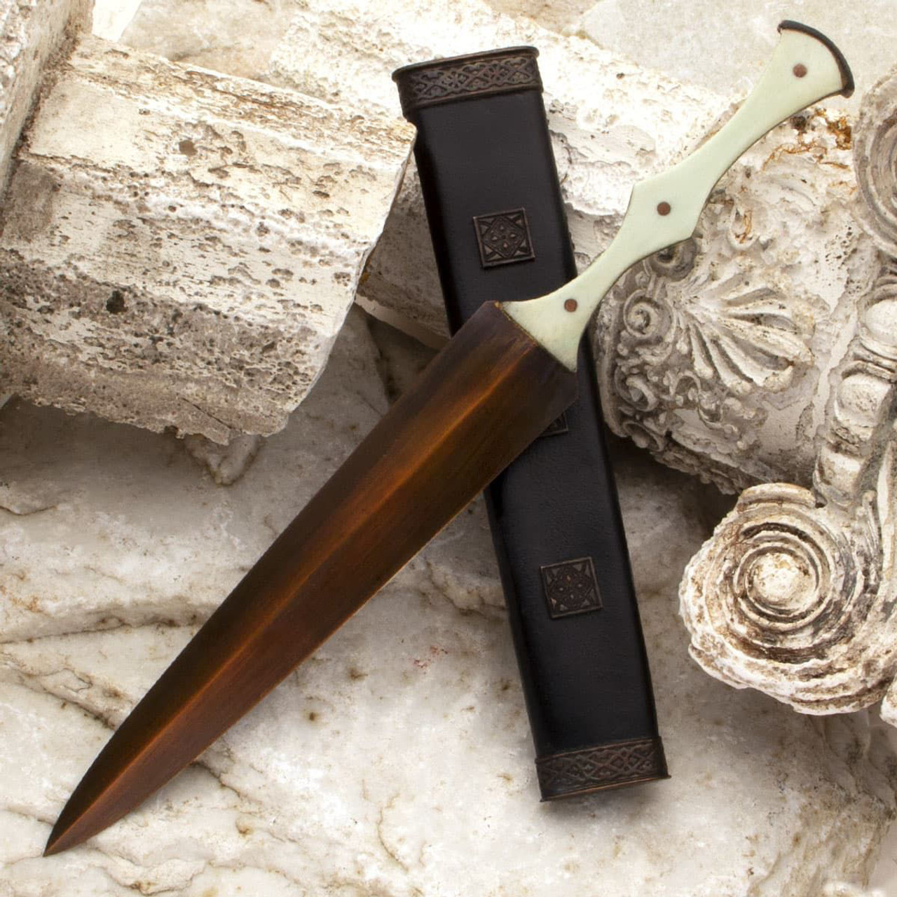 PeloponnesianÂ Dagger with bronze blade, scalloped bone scales and bronze embellished leather belt sheath