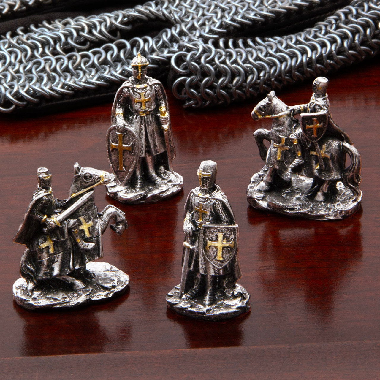 set of 12 miniature hand-painted resin statues of armored Crusader Knights are hand painted with a metalized finish