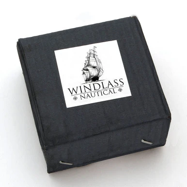 unique wood paperweight has compass on top with a brass rim, 79" tape measure inside, brass anchor inlaid on the side