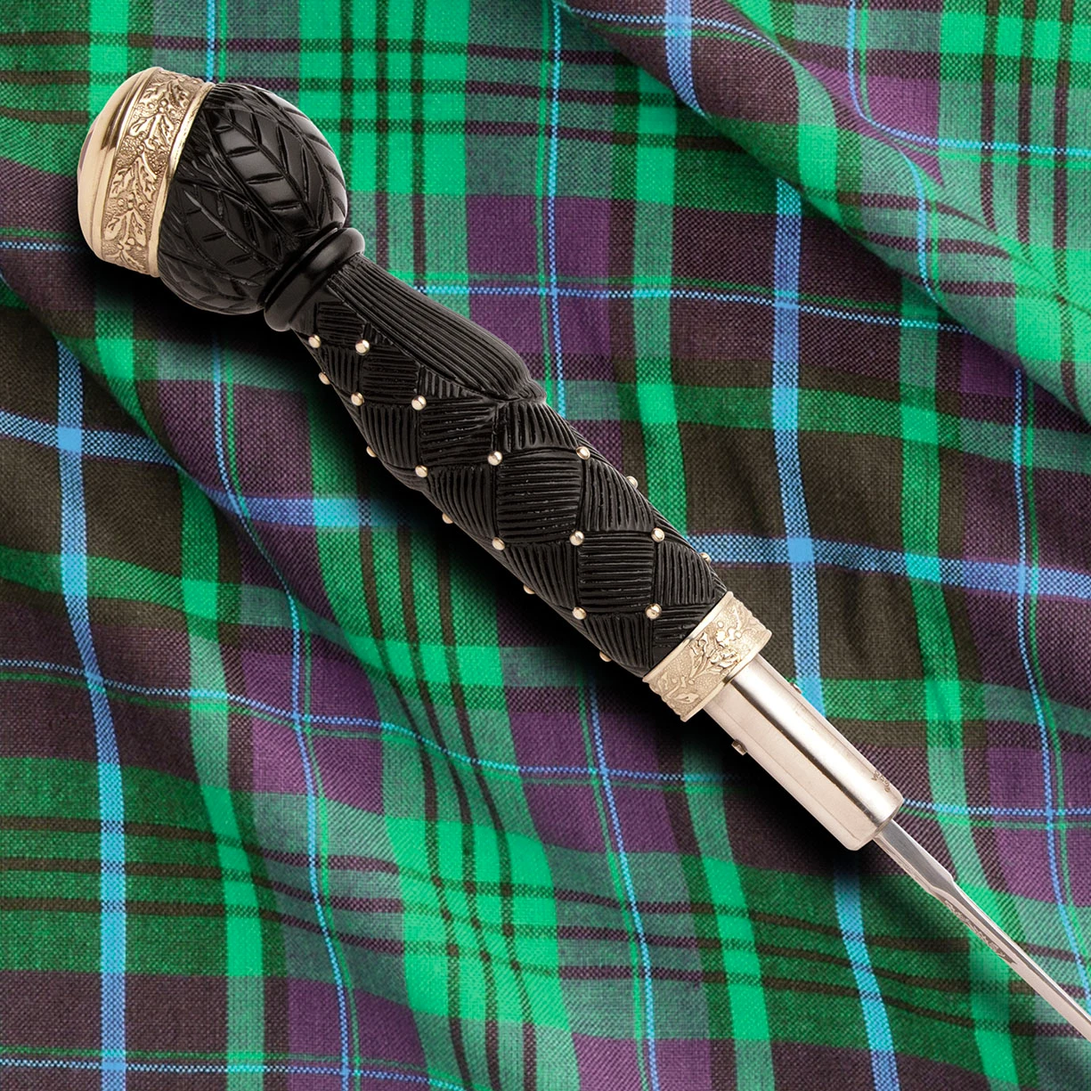 Scottish Sword Stick Walking Cane has engraved blade, handle has carved interwoven pattern, ornamental nickel silver tacks