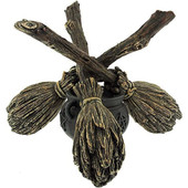 Witchcraft Crystal Gazing Ball rests atop a trio of broomsticks and a cauldron, finely detailed cold cast resin base