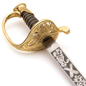 hilt of reproduction Confederate Staff & Field Officer's Sword with brass fittings and wire wrapped leather grip