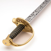 hilt of reproduction Confederate Staff & Field Officer's Sword with brass fittings and wire wrapped leather grip