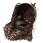 solid brass Indo-Persian fighting helmet is engraved, features brass mail aventail, and ornately embellished brass nasal bar 