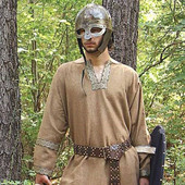 wool blend brown Viking tunic with Nordic design trim on sleeves, collar and hem, all accurate to the period
