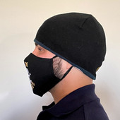 Side View of Black Cotton Face Mask with silk embroidered words Rum Storage, adjustable straps and pocket for disposable filter