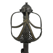 Cromwell Sword has blackened guard decorated in a gold foliage pattern with a wire-wound sharkskin grip