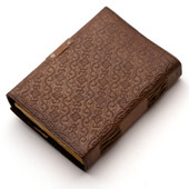 dragon head leather journal has embossed back cover and accent stitching on the spine