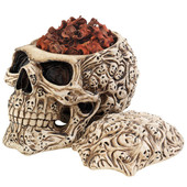 Skull's Soul Spirit Keepsake Box is a decorative skull featuring tortured souls, storage for trinkets inside