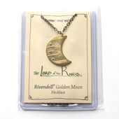 LOTR Golden Moon necklace shows Rivendall valley with waterfalls, ancient silver and gold trees, three Silmarils shown as stars