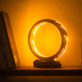 large LOTR One Ring Lamp has a warm glow, the sturdy stand has an on/off button and allows display on tables and shelves