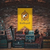 Officially Licensed Harry Potter Hufflepuff House banner is printed on one side and has metal grommets for hanging