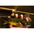 Brook trout in hand with a Douglas Upstream fly rod