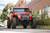 FS-25 Stubby Front Bumper with Plated Bull Bar - DV8 Offroad FBJL-06