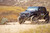 FS-25 Stubby Front Bumper with Plated Bull Bar - DV8 Offroad FBJL-06