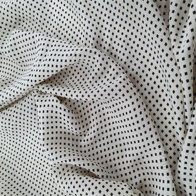 Cream Printed Cupra Silk Fabric