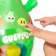 Stehaufpuppe Gusy Luz mit bunten Kugeln