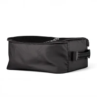 A rectangular Earth EV portable charger bag from the side, showing a side perpendicular to its carrier handle