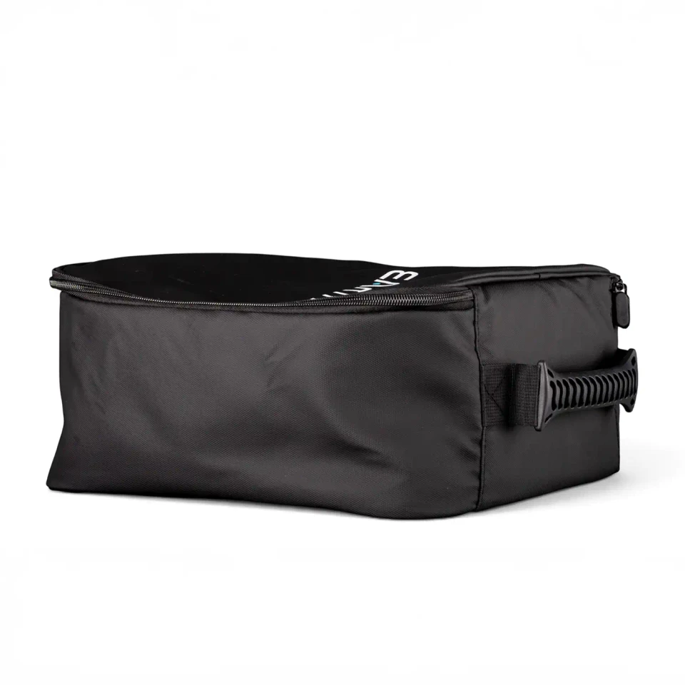 A rectangular Earth EV portable charger bag from the side, showing a side perpendicular to its carrier handle