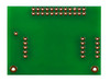 The back of a green circuit board with 2x12 thru-hole connection points.