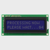 Front view of an unlit 16x2 character LCD with an unlit screen showing white text on a dark blue background.