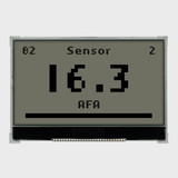 Front view of a 128x64 graphic COG LCD showing black pixels on a dark gray background depicting backlight is off.