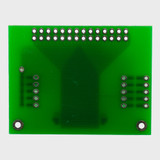The back of a green circuit board with 2x14 thru-hole connection points.