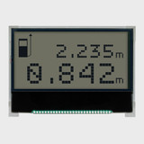 Front view of a 128x64 pixel graphic COG LCD showing dark pixels on an FSTN+ gray screen.