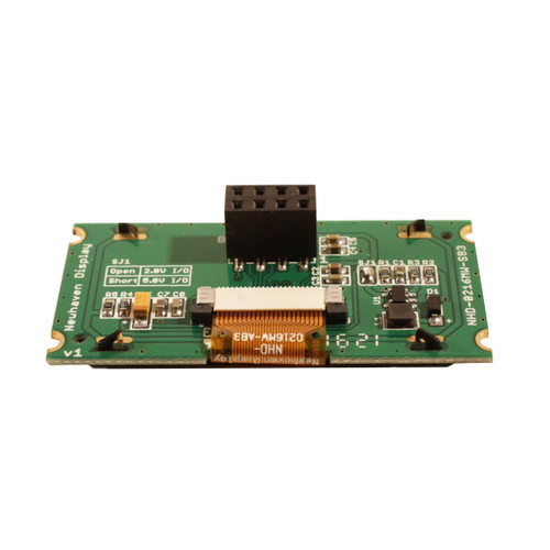 An angled view of the PCB on the back of an OLED display, highlighting the depth of the board and 2x4 pin header.