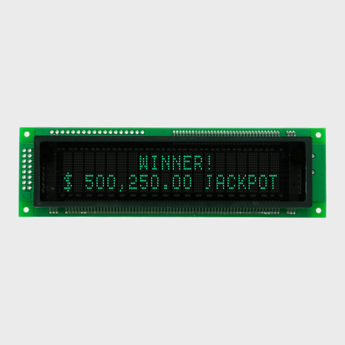 A 20x2 character VFD on a green circuit board showing text in illuminated green 5x8 dot matrix characters.
