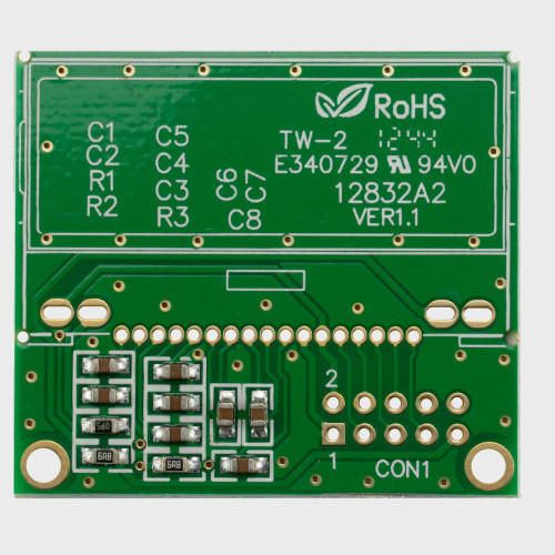 The front of a green circuit board with 17-pin and 2x4 pin thru-hole connection points with various other components.