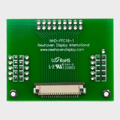 The front of a green circuit board with an 18-pin FFC connector and 2x9 thru-hole connection points.