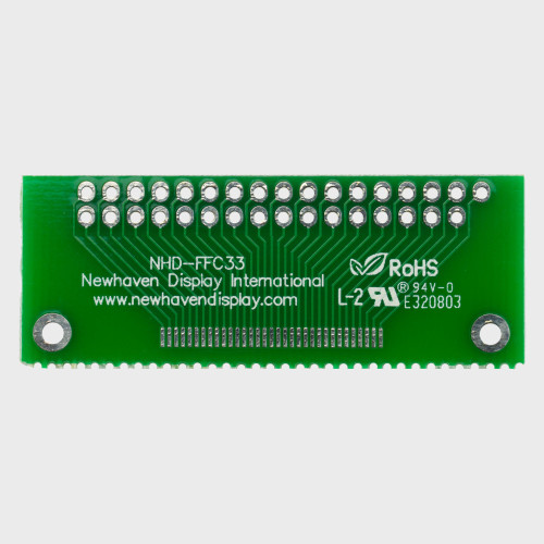 The front of a green circuit board with 33-pin FFC solder pads and thru-hole connection points.