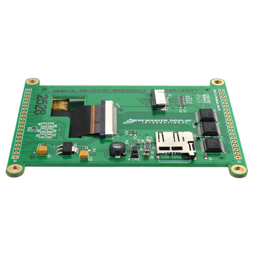 Back horizontal view of a green circuit board with the back edge angled slightly toward the camera to show various components, connections, and a microSD card reader.
