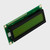 An inactive STN+ yellow-green LCD with the left side angled toward the viewer, showcasing the depth of the display.