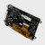 Angled view of a black HDMI PCB featuring various components and mounting holes for a 5-inch TFT.