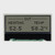 Front view of a 128x32 graphic COG LCD showing black text on an unlit FSTN+ gray background.