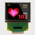 Front view of a 1.27 OLED glass display with 128x96 pixels, showing a full-color graphic for medical heart bpm.