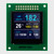 Front view of a 1.5 OLED display with 128x128 pixels on a green PCB, showing a full-color informational readout for scuba diving.