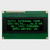 Front view of a 20x4 character OLED display module on a green PCB showing illuminated green text on a black background.