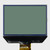 Front view of an inactive graphic COG LCD with a blank STN+ gray screen.