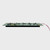 The side of a graphic LCD module lying on its screen to highlight the display's depth, circuit board components, and backlight cable.