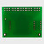 Tył zielonej płytki drukowanej z 2x18 punktami połączeniowymi typu thru-hole.